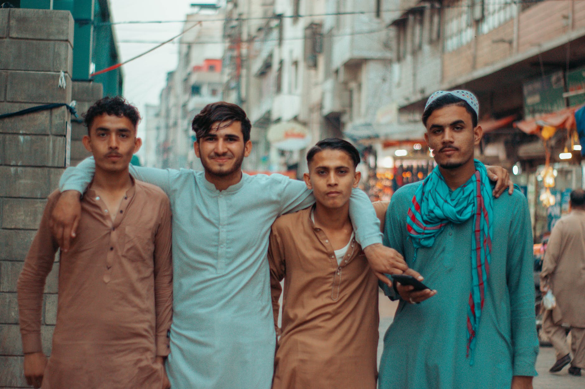 group of young men in city